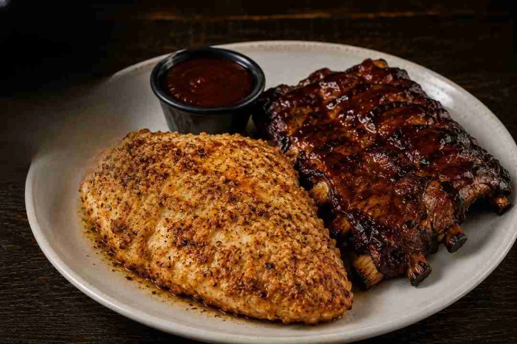 9 oz. Parmesan Crusted Chicken with Half-Rack Baby Back Ribs